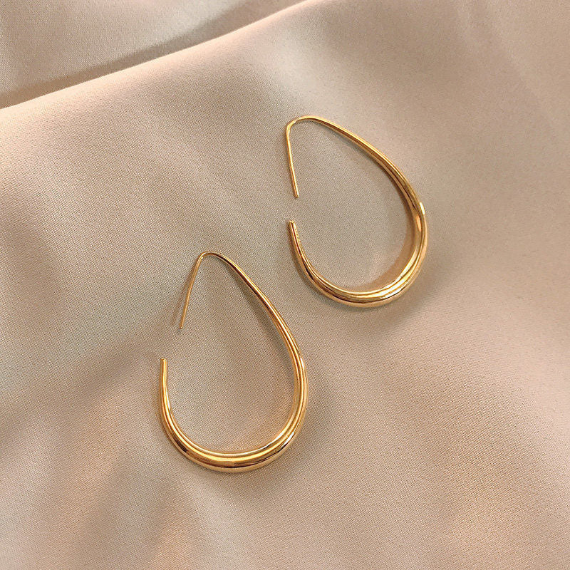 BOUCLES D’OREILLES CRÉOLES FLUIDES