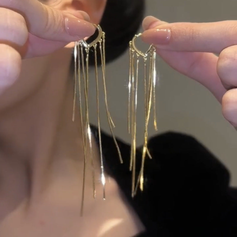 BOUCLES D’OREILLES À LONGUES FRANGES