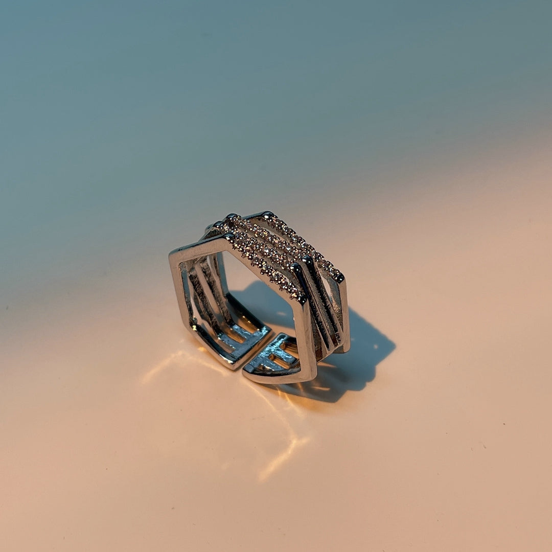 BAGUE AJUSTABLE HEXAGONE EN ZIRCONIUM