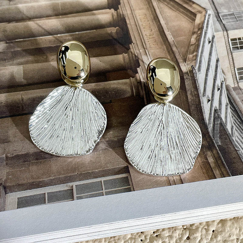 BOUCLES D’OREILLES COQUILLAGE EN OR ET ARGENT