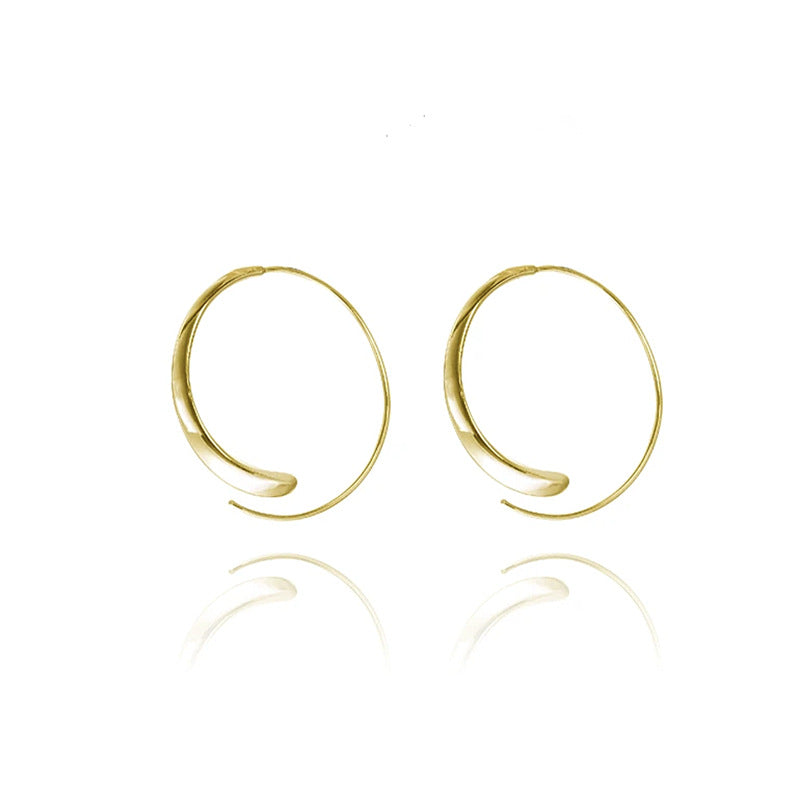 BOUCLES D’OREILLES CRÉOLES GRANDES ET COURBÉES