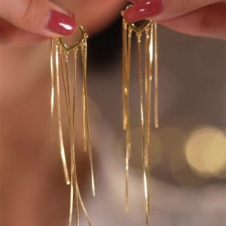 BOUCLES D’OREILLES À LONGUES FRANGES