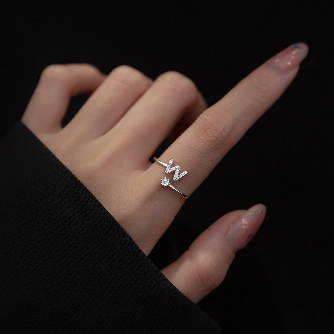 BAGUE EN ARGENT STERLING AVEC LETTRE EN ZIRCONIUM