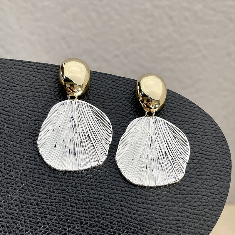 BOUCLES D’OREILLES COQUILLAGE EN OR ET ARGENT