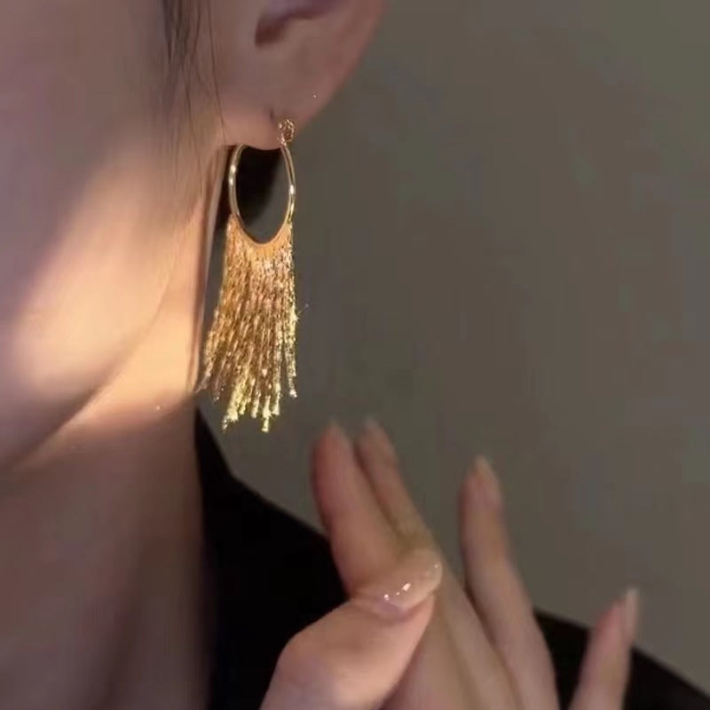 BOUCLES D’OREILLES CRÉOLES À FRANGES