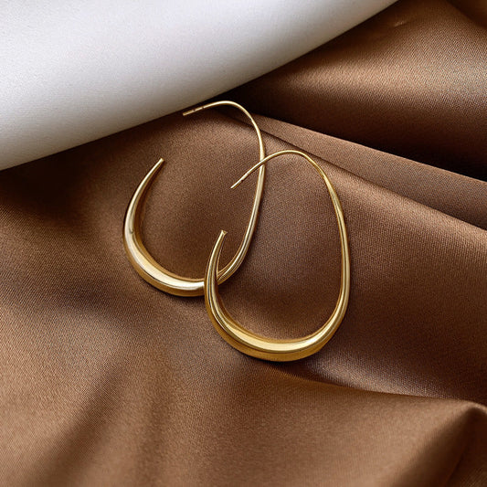 BOUCLES D’OREILLES CRÉOLES FLUIDES