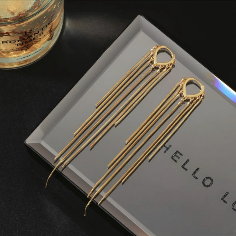 BOUCLES D’OREILLES À LONGUES FRANGES