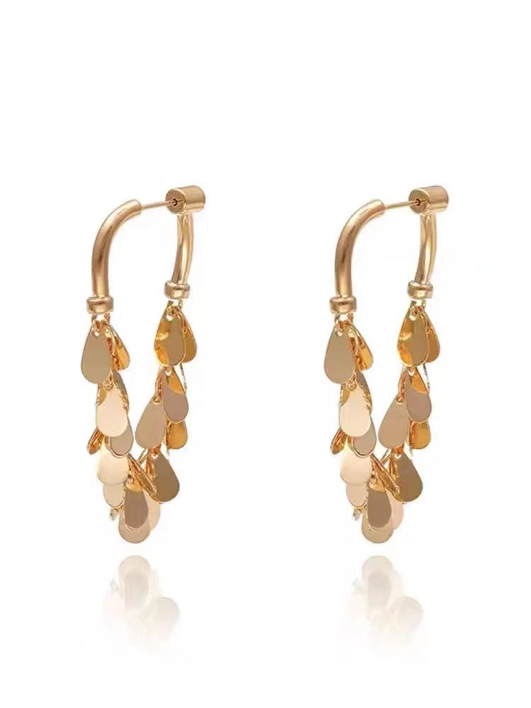 BOUCLES D’OREILLES À FRANGES ET PAILLETTES