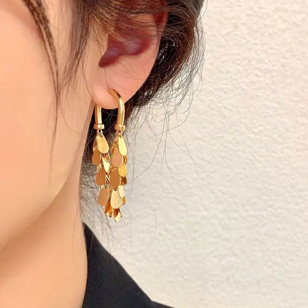 BOUCLES D’OREILLES À FRANGES ET PAILLETTES