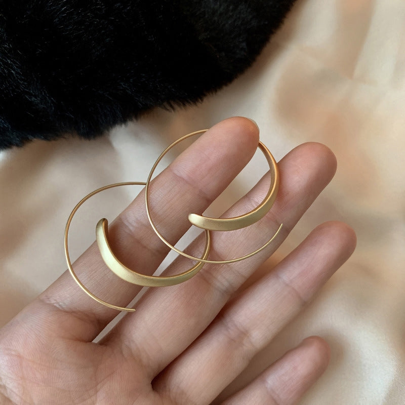BOUCLES D’OREILLES CRÉOLES GRANDES ET COURBÉES