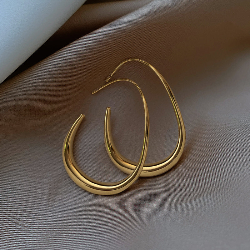BOUCLES D’OREILLES CRÉOLES FLUIDES