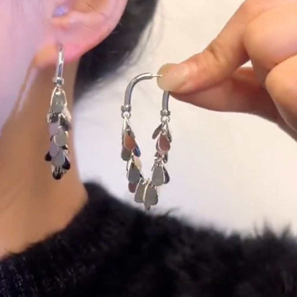 BOUCLES D’OREILLES À FRANGES ET PAILLETTES