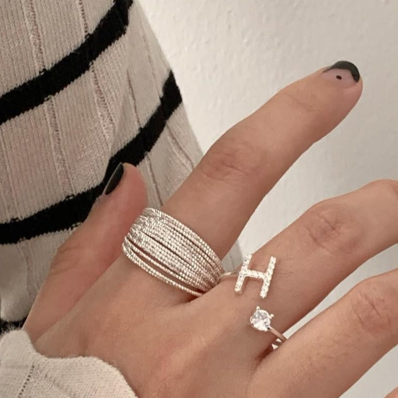 BAGUE EN ARGENT STERLING AVEC LETTRE EN ZIRCONIUM