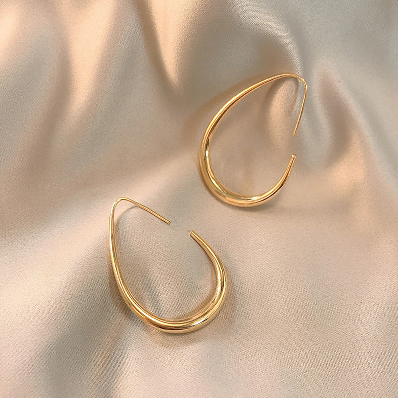 BOUCLES D’OREILLES CRÉOLES FLUIDES