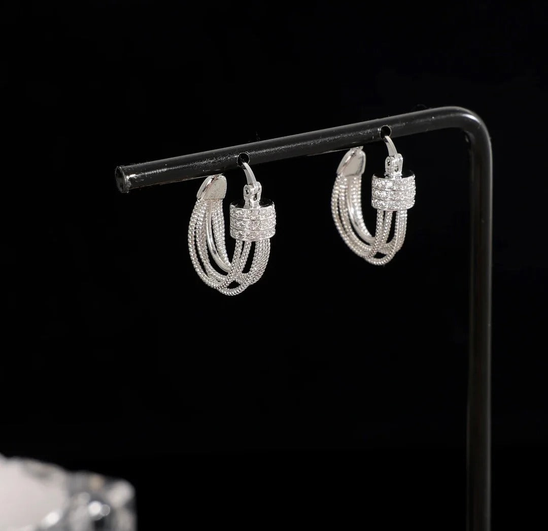 BOUCLES D’OREILLES À COUCHES GÉOMÉTRIQUES