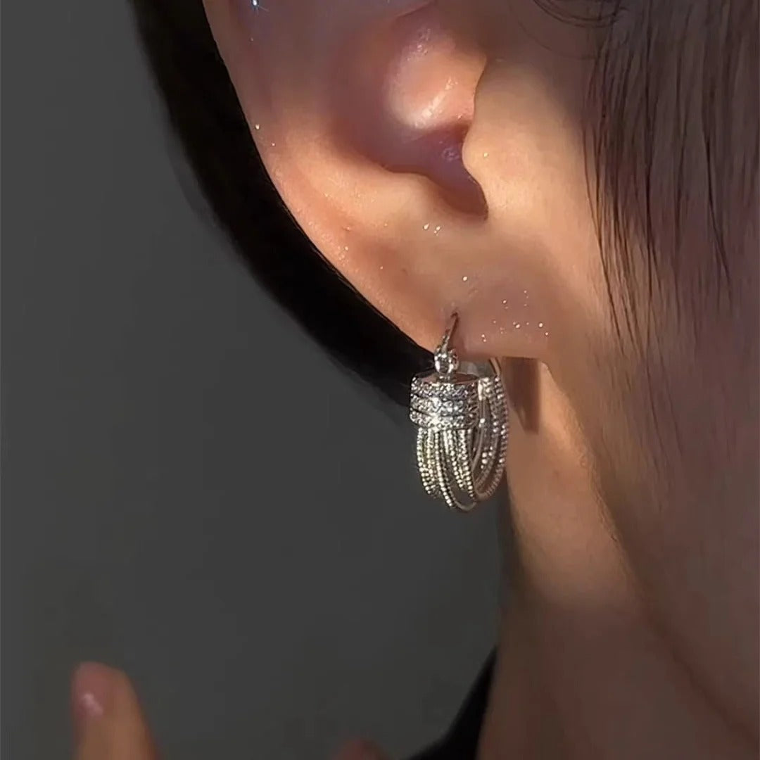 BOUCLES D’OREILLES À COUCHES GÉOMÉTRIQUES