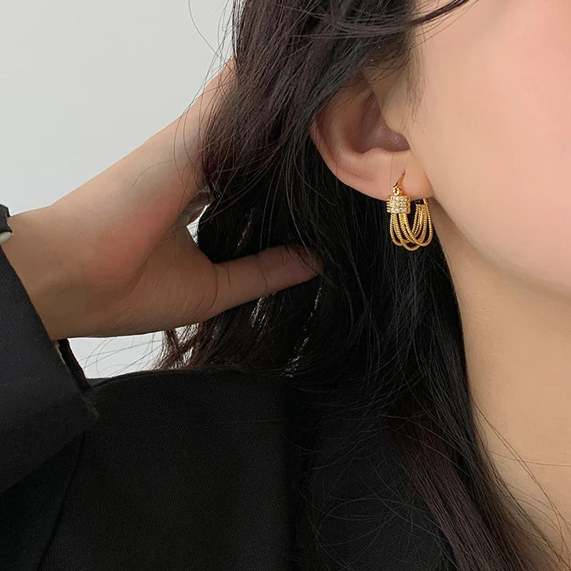 BOUCLES D’OREILLES À COUCHES GÉOMÉTRIQUES