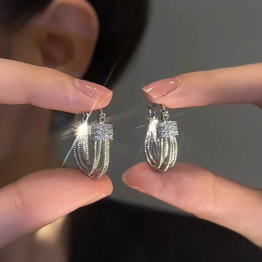 BOUCLES D’OREILLES À COUCHES GÉOMÉTRIQUES
