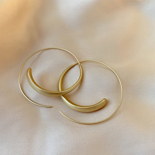 BOUCLES D’OREILLES CRÉOLES GRANDES ET COURBÉES